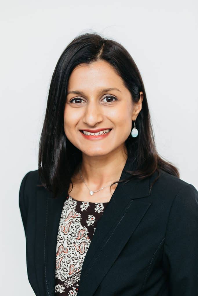 Ms Chaitali Naik smiling, professional portrait, eye care specialist, Vision For Life.