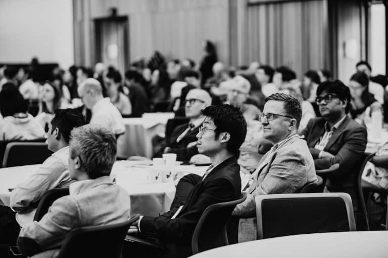 Attendees at the VFLI Conference 2026 listening to speakers, focused on eye health and vision care i.