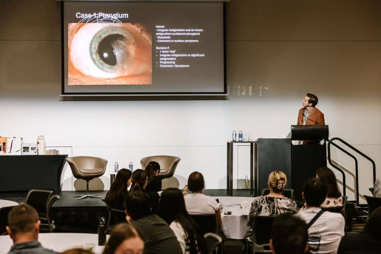 Presenter at VFLI Conference 2026 delivering ophthalmology presentation to audience.