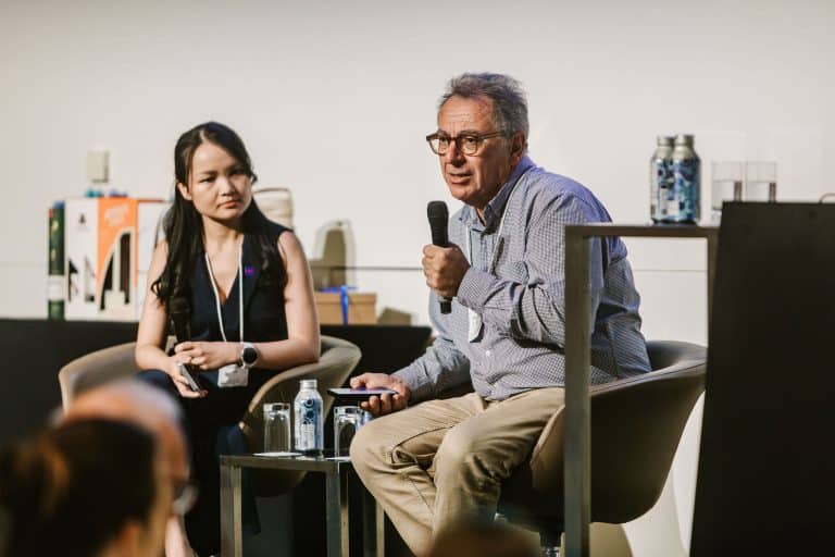 Experienced speaker sharing insights at VFLI Conference 2026.