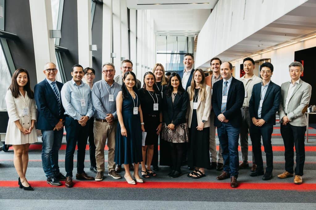 Diverse group of professionals at the VFLI Conference 2026 in a modern venue.
